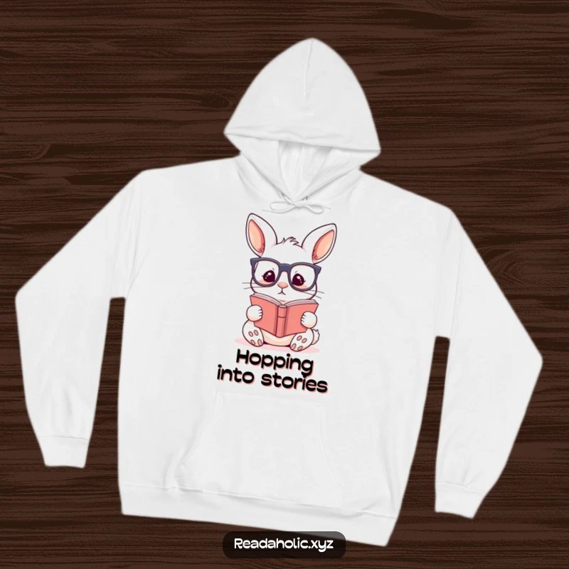 Funny kawaii rabbit hoodie featuring a cute rabbit wearing glasses and engrossed in a story, perfect for cozy reading.